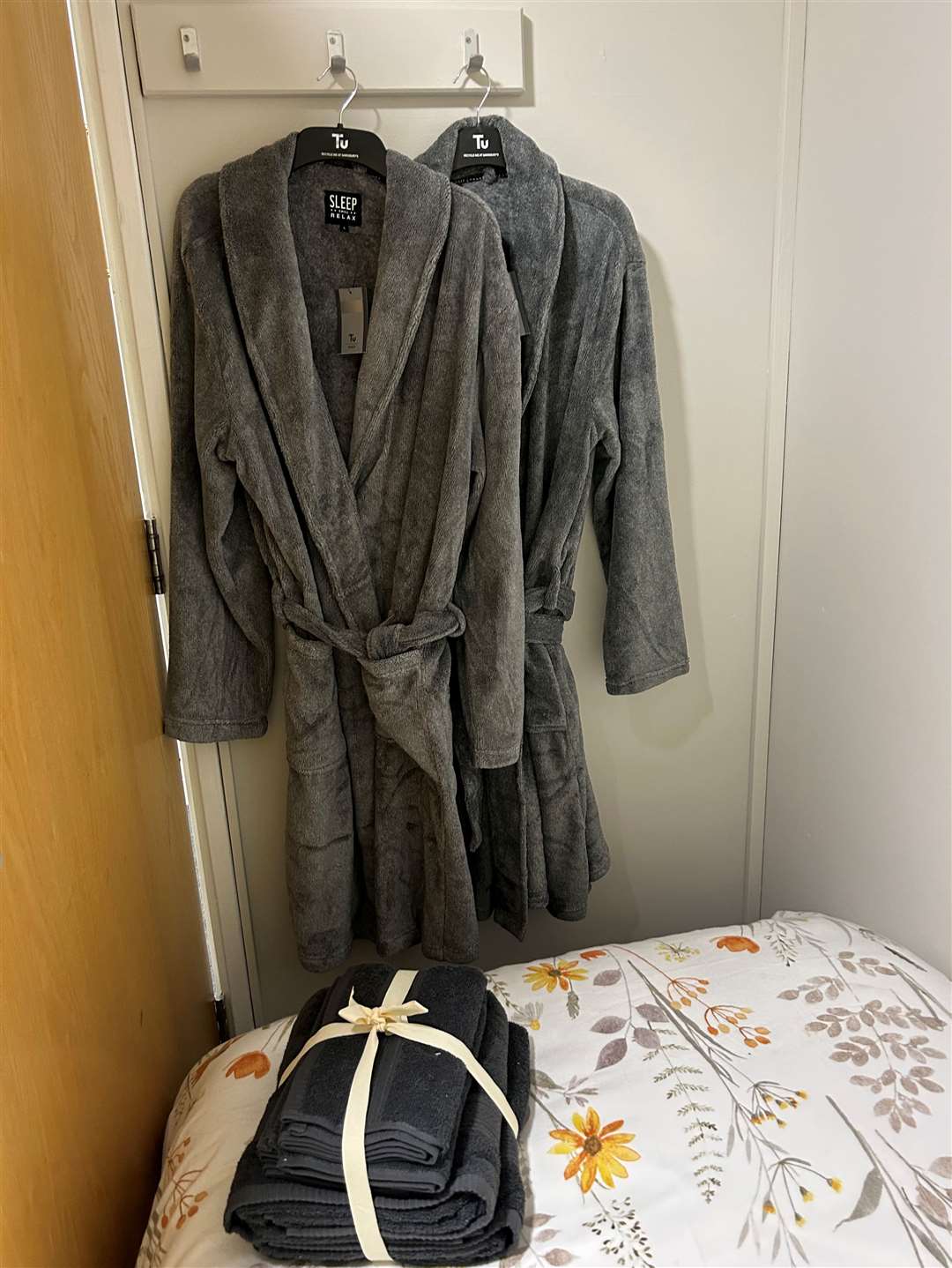 There are dressing gowns and toiletries in the room
