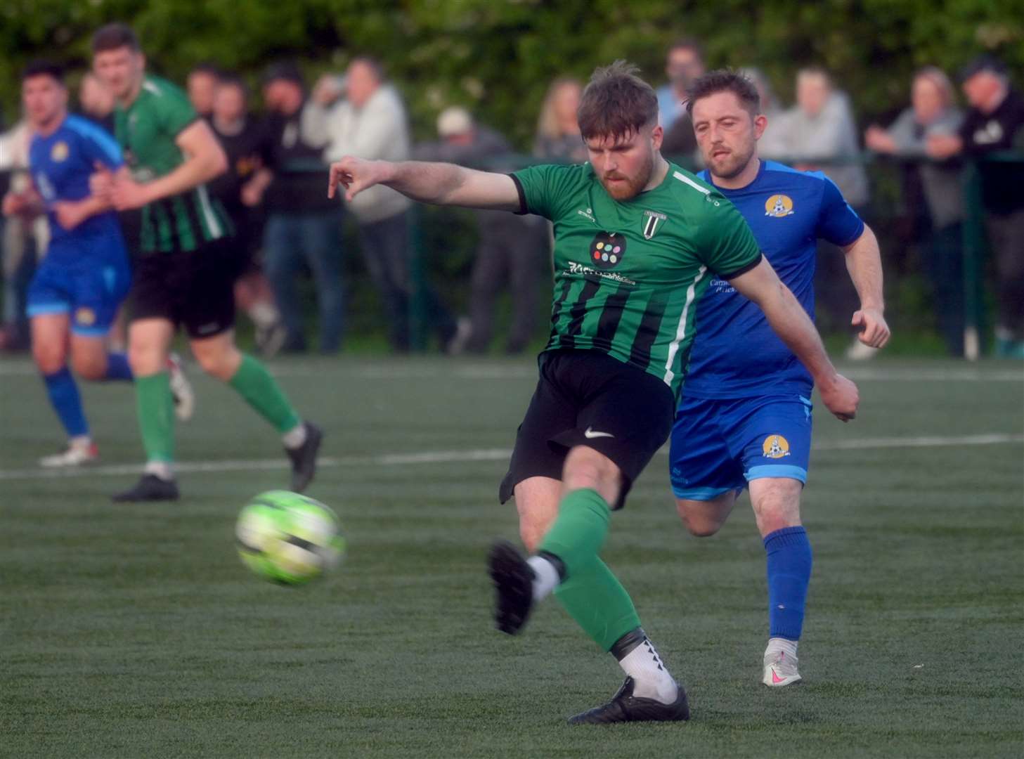 March (Blue) v Blackstones (Green and Black) in the final of the Hinchingbrooke Cup