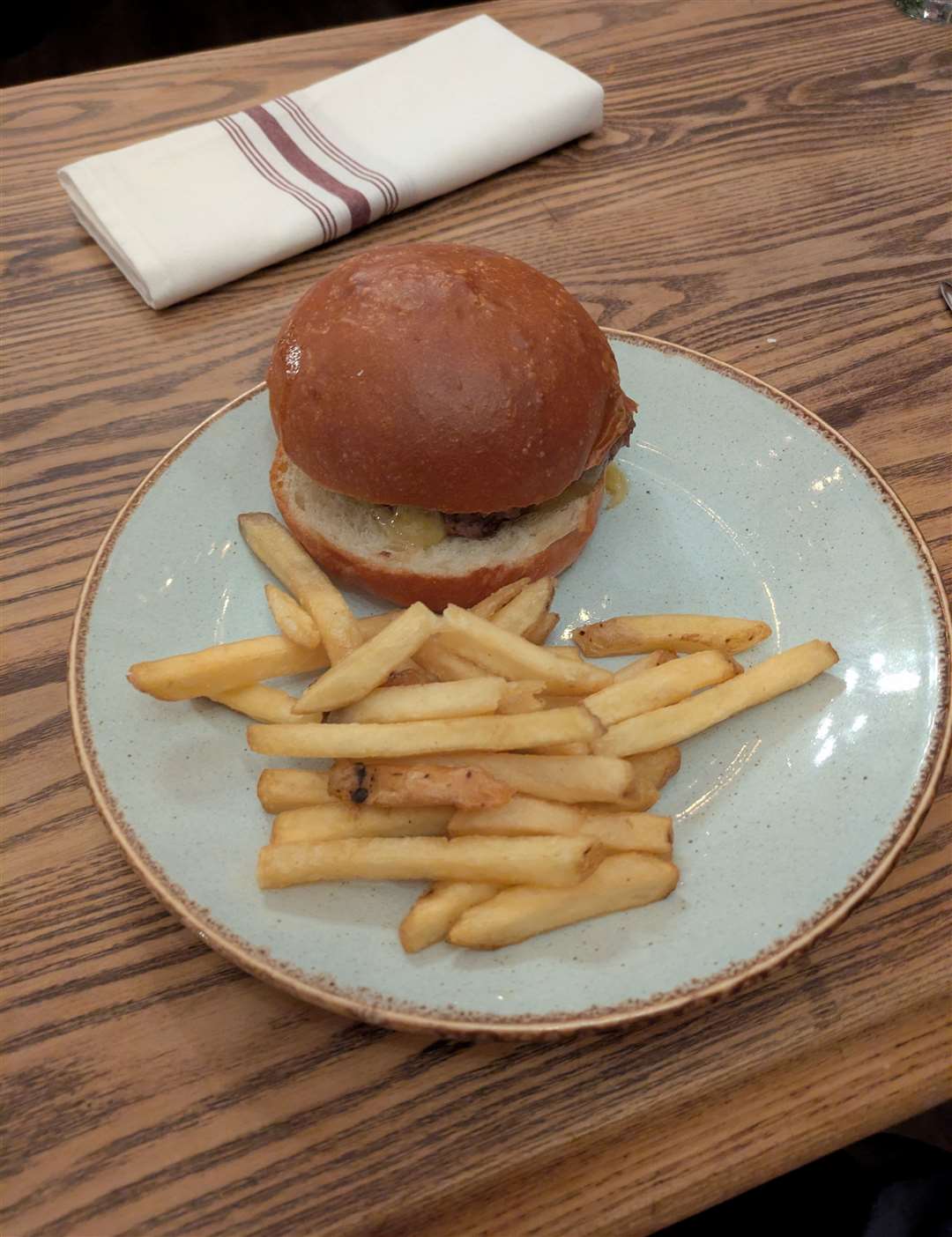 The children's cheeseburger and chips.