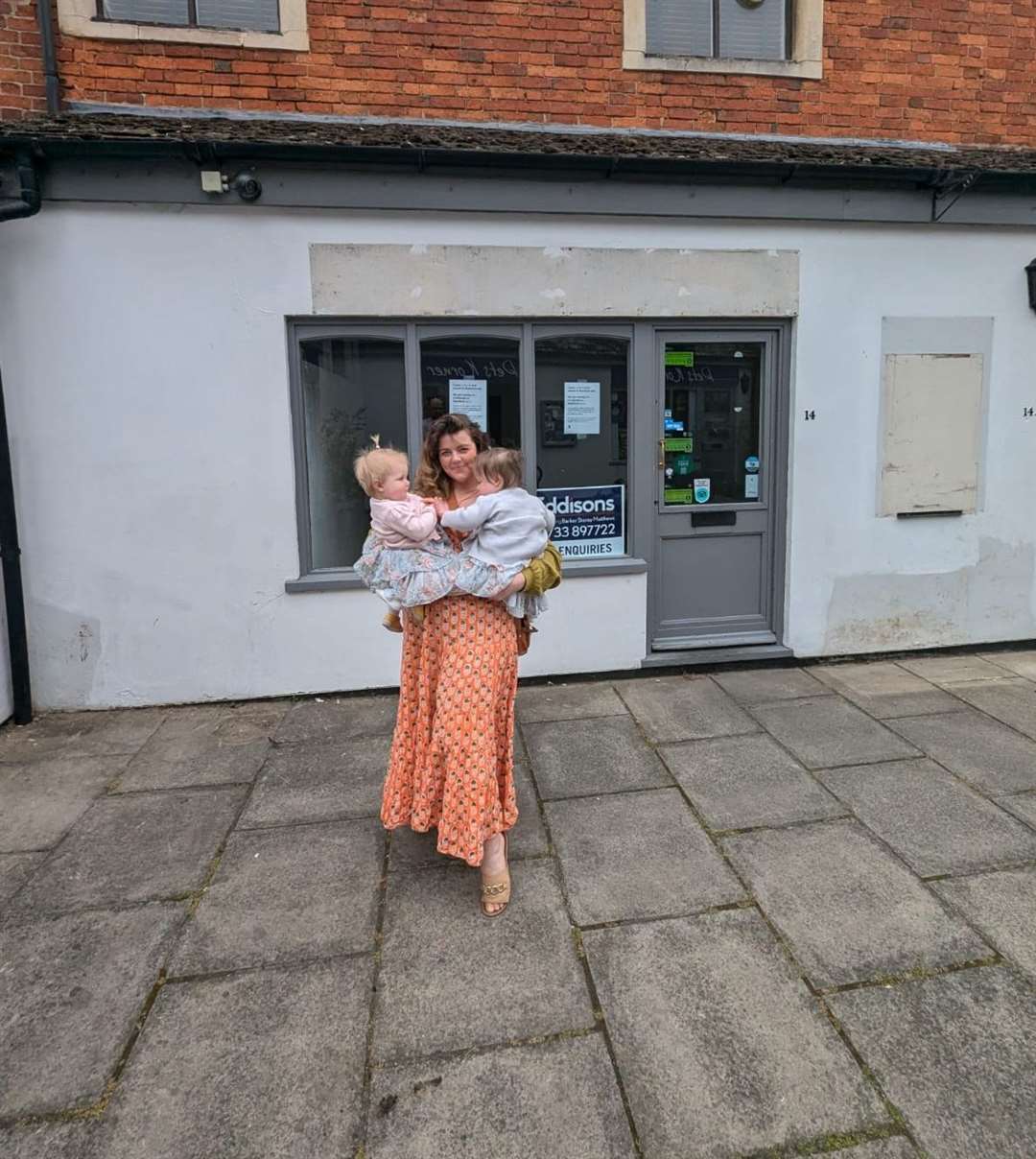 Etta Lingerie, with her children Poppy and Bridget outside the new shop