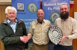 Simon Pepper, centre, landed the best rainbow prize. He is pictured with John Wadham and Jack Perks.