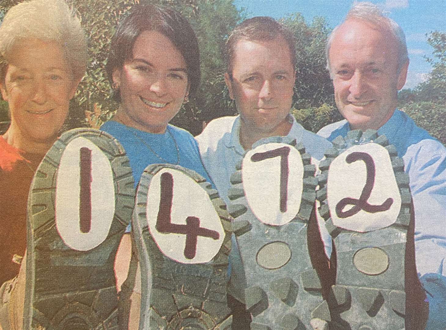 Iris Mason, Nina Corbett, Anton Gaches and John Mason, chairman of the Macmillan Fund, with the grand total 25 years ago.