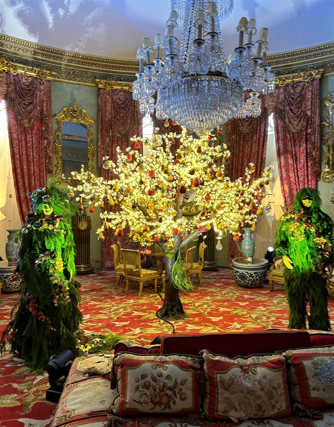 Two green figures are made from shrubbery in the grounds of Belvoir Castle