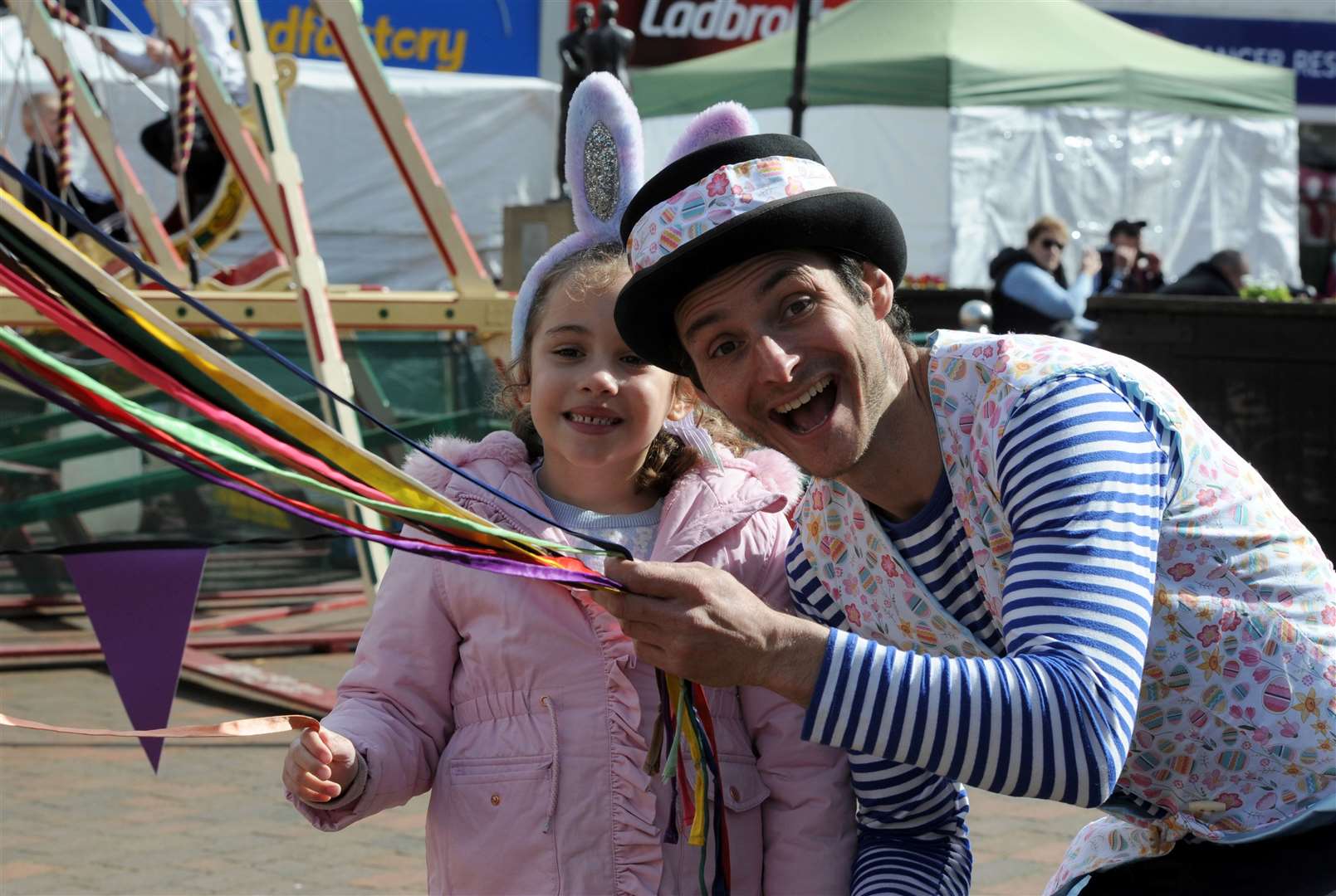 Martin and Kaycee Savage, 6, enjoy the May Pole