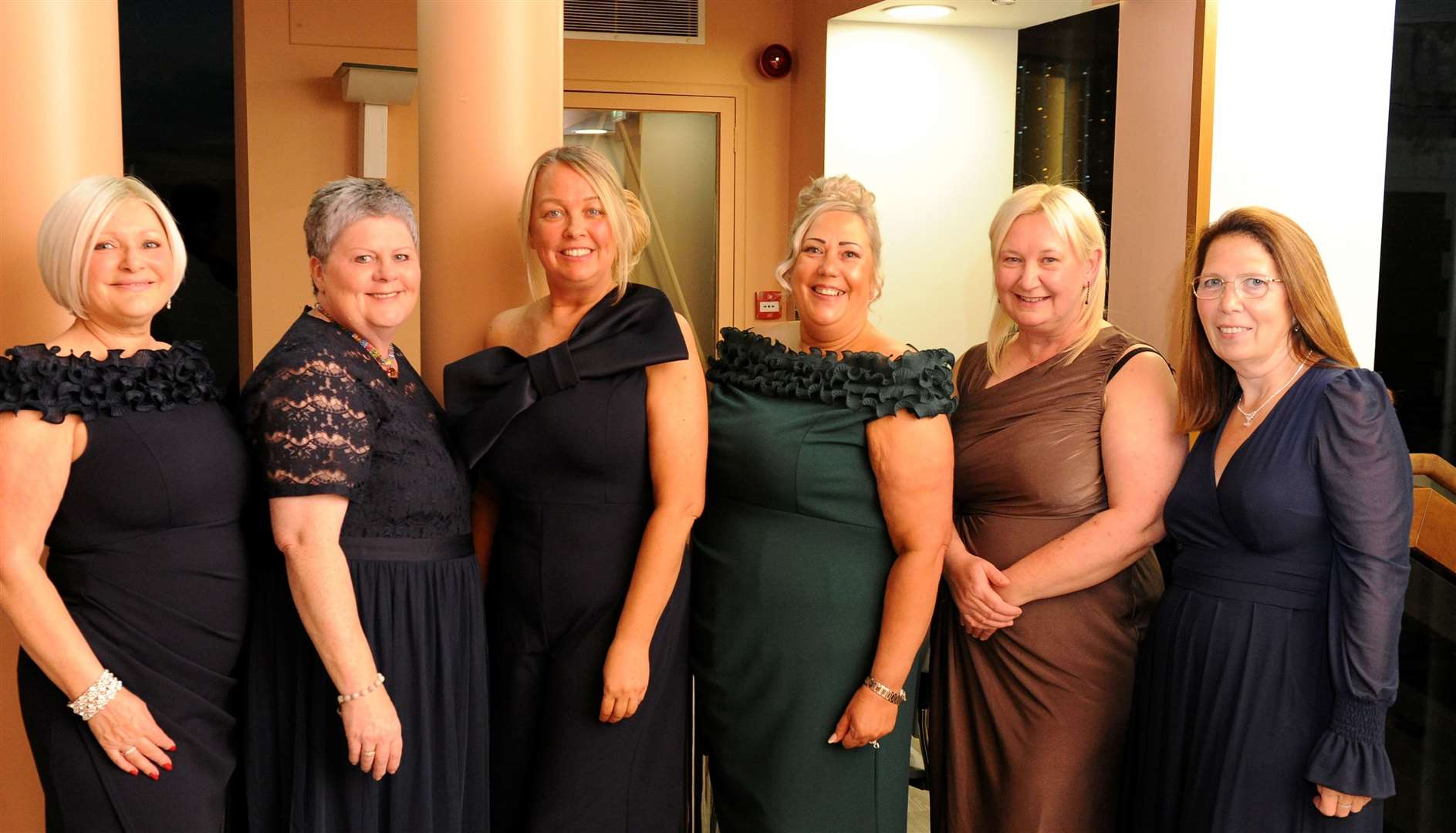These ladies were glammed up for the ball. Photo: Chris Lowndes