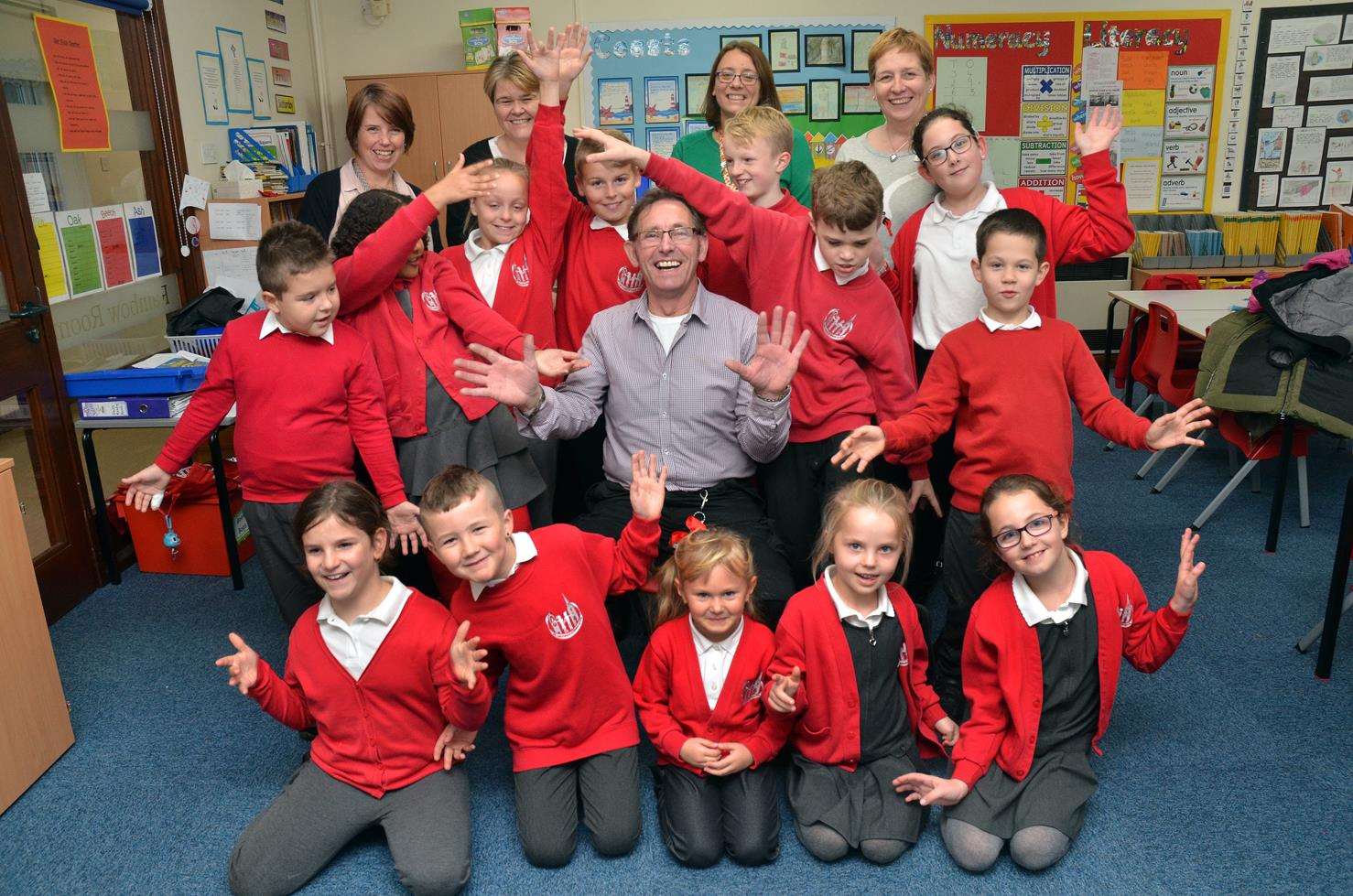 George with pupils and staff at William Stukeley C of E Primary School. (5530121)