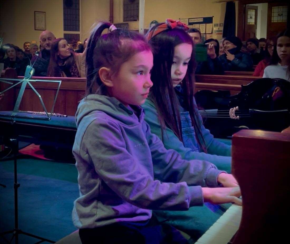 Sisters Esther and Esme Corbett duet Daisy, Daisy. Photo: Blue Cat Music School