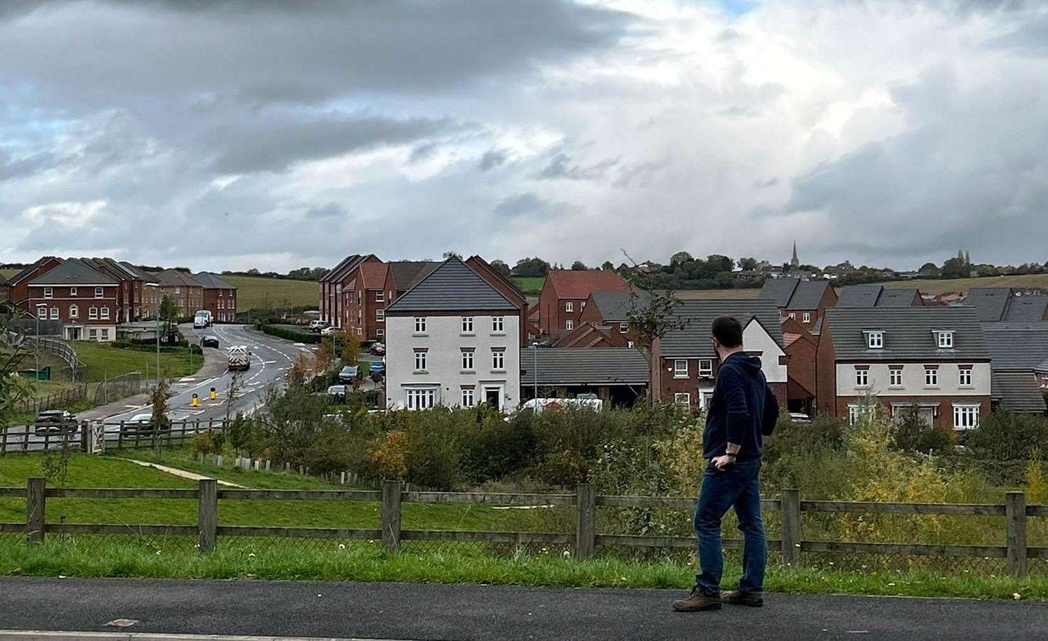 Paul Martin looking out over the Poplar Farm estate.
