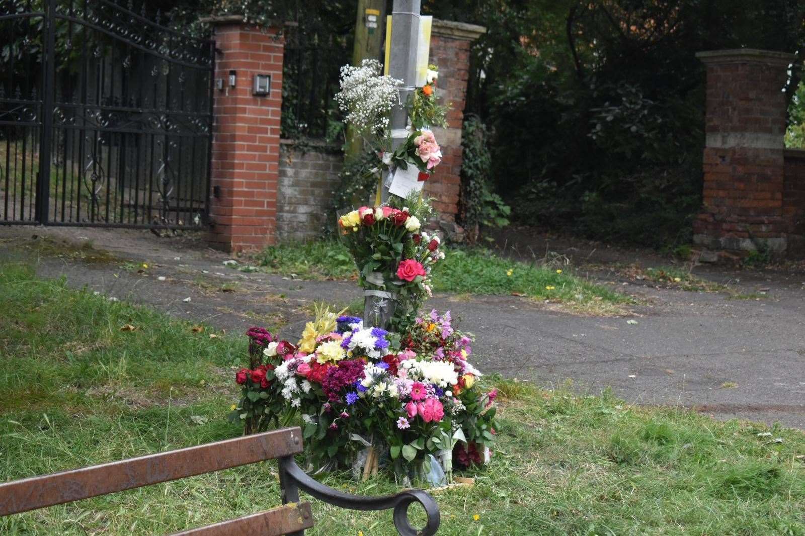 Floral tributes have been left for a woman who had died earlier this week