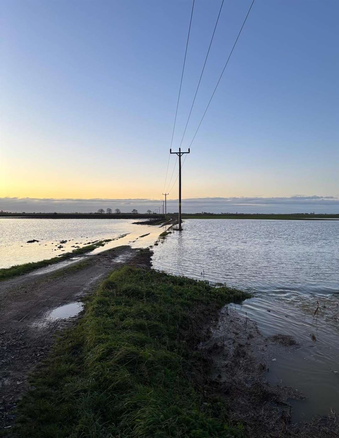 Ben Atkinson's fields have been flooded as a result of water overtopping the damaged South Forty Foot Drain bank at Dunsby Fen