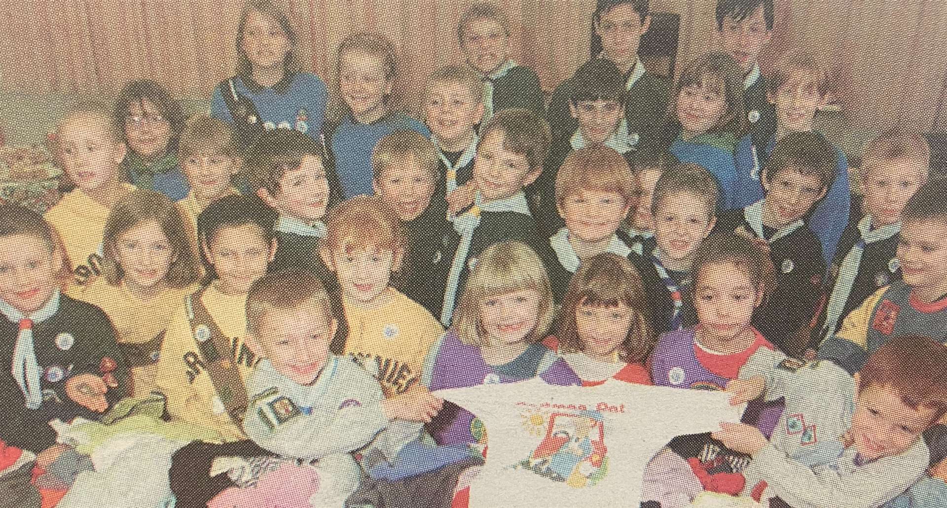Wittering scout and guide groups lending a helping hand 25 years ago.