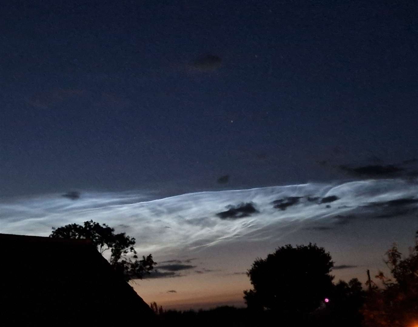 Sue Colam took this photo of the noctilucent clouds