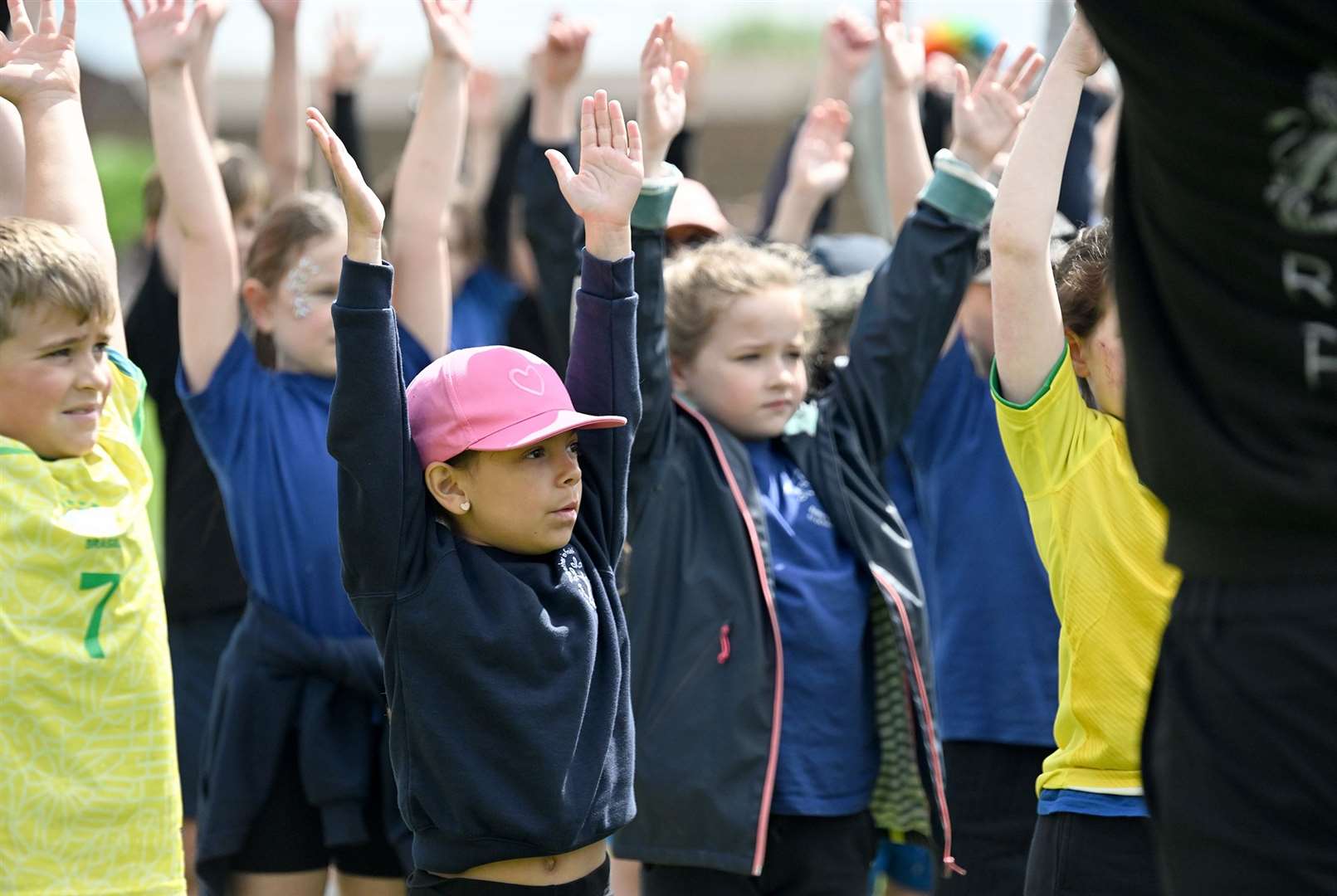 Grantham children warming up on day one of the Mini Olympics.