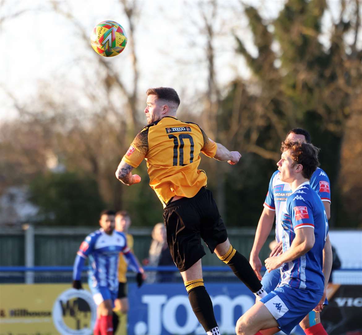 Lee Shaw heads in the opening goal at Leiston on Saturday. Photo: Rob O’Brien