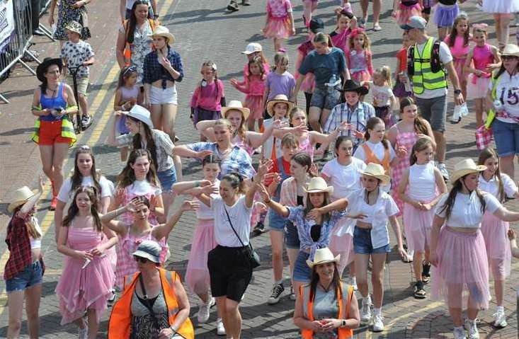 Many community groups took part in this year's flower parade