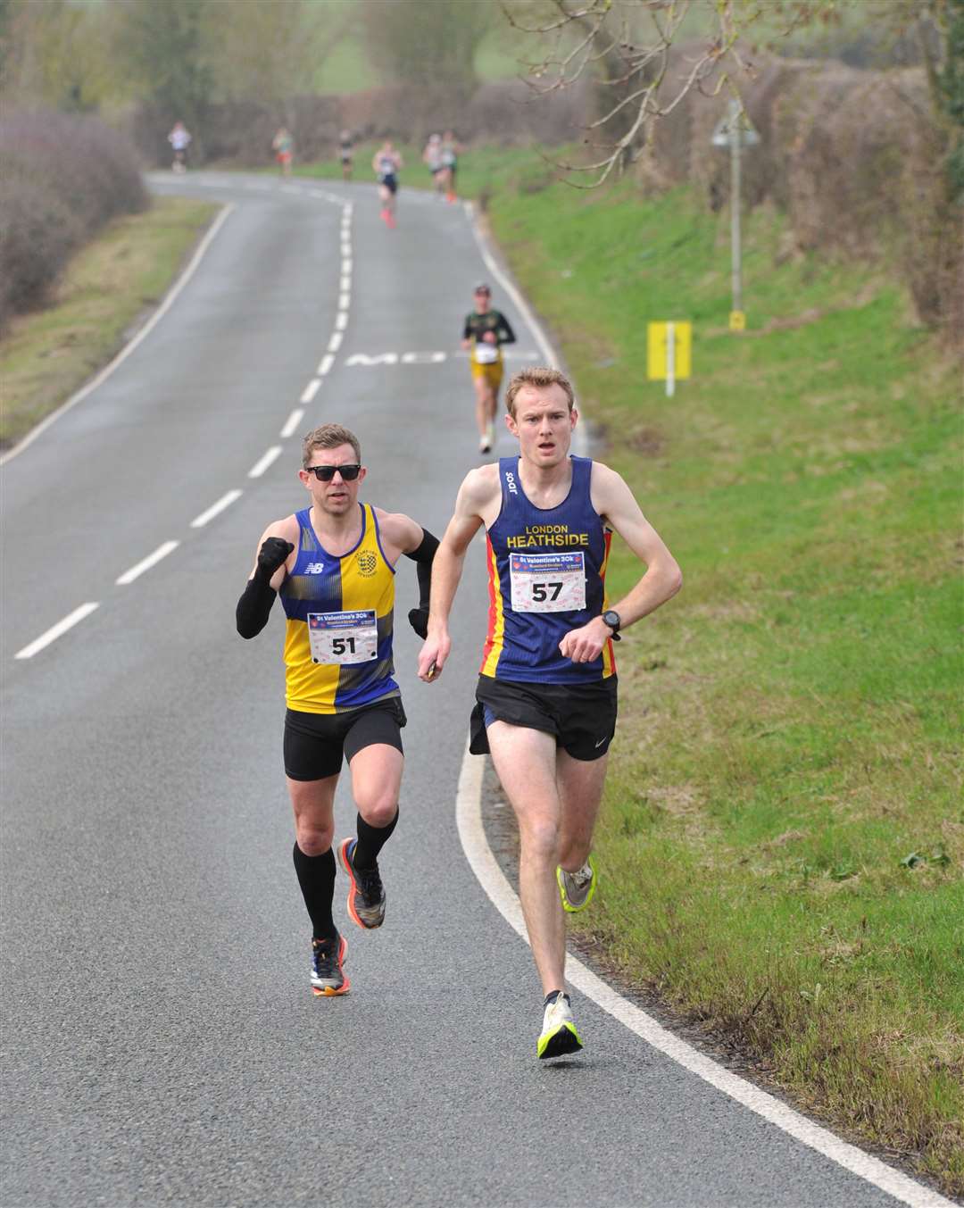 Stamford Strider Luke Harrison chases down Pete Northall from London Heathside. Photo Chris Lowndes