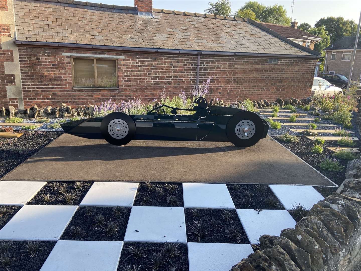 A replica of BRM's world championship-winning car of 1962, complete with chequered flag paving. Photo: Iliffe Media