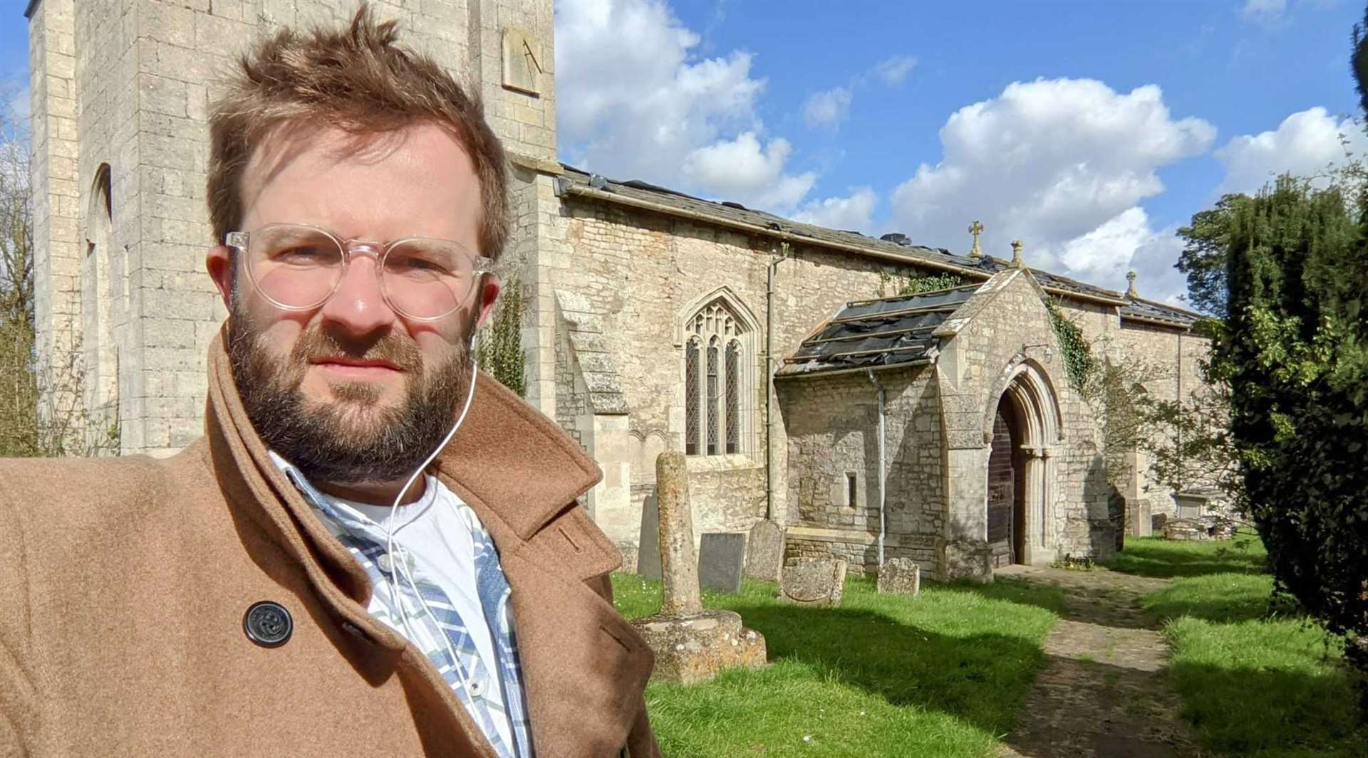 Councillor Ben Green outside St Mary's Church, in North Witham.