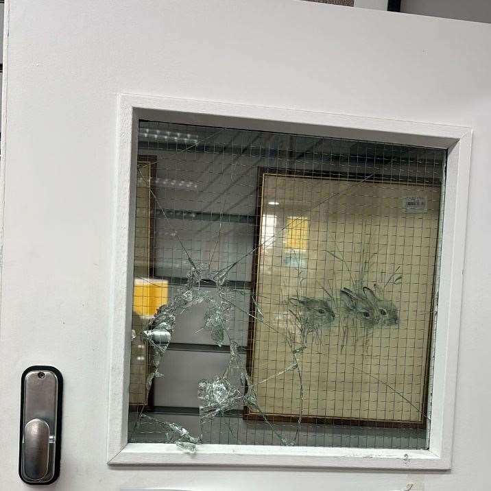 A broken door at Sense’s charity shop in Spalding CREDIT Sense
