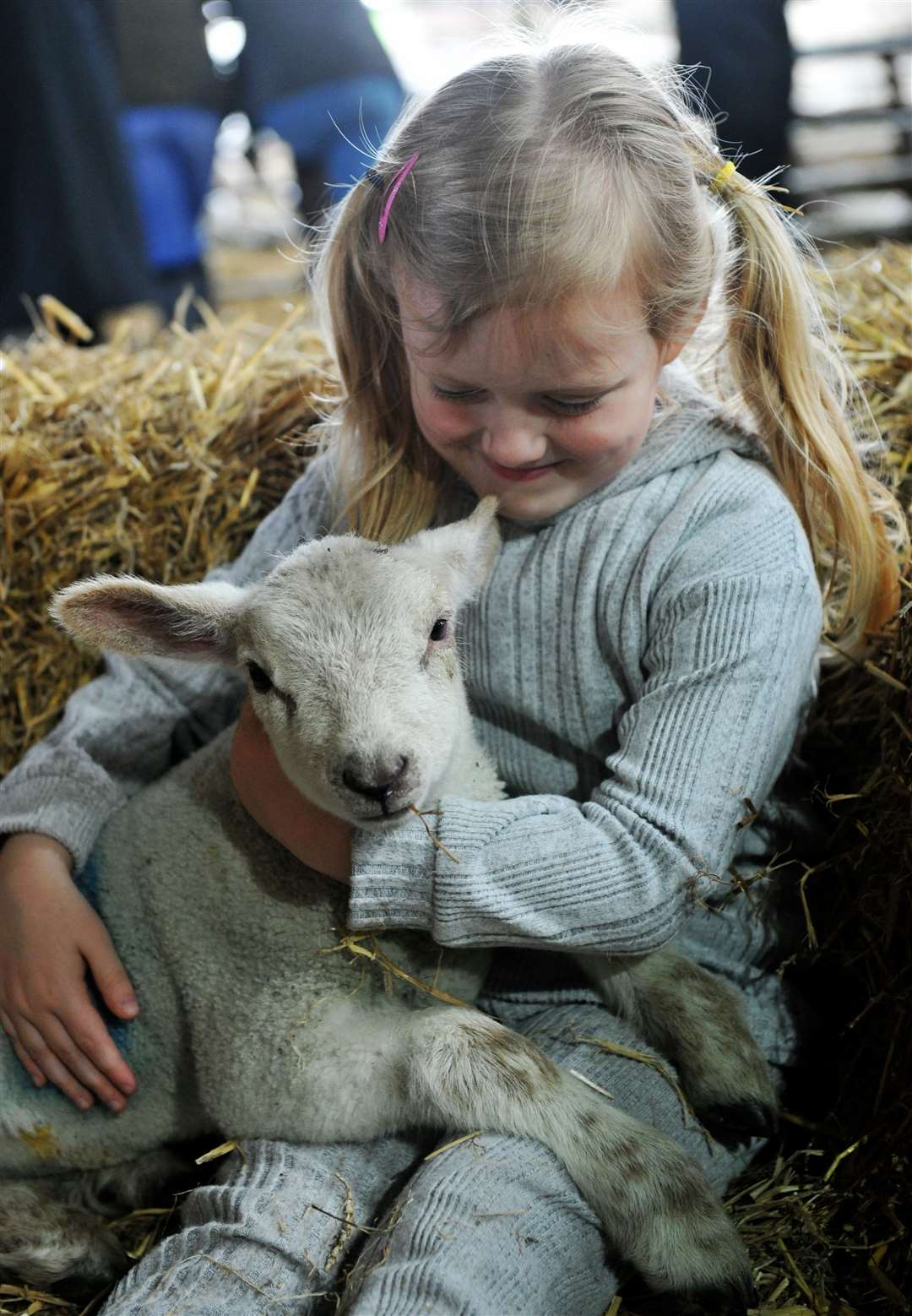 Five-year-old Hollie enjoys a hug