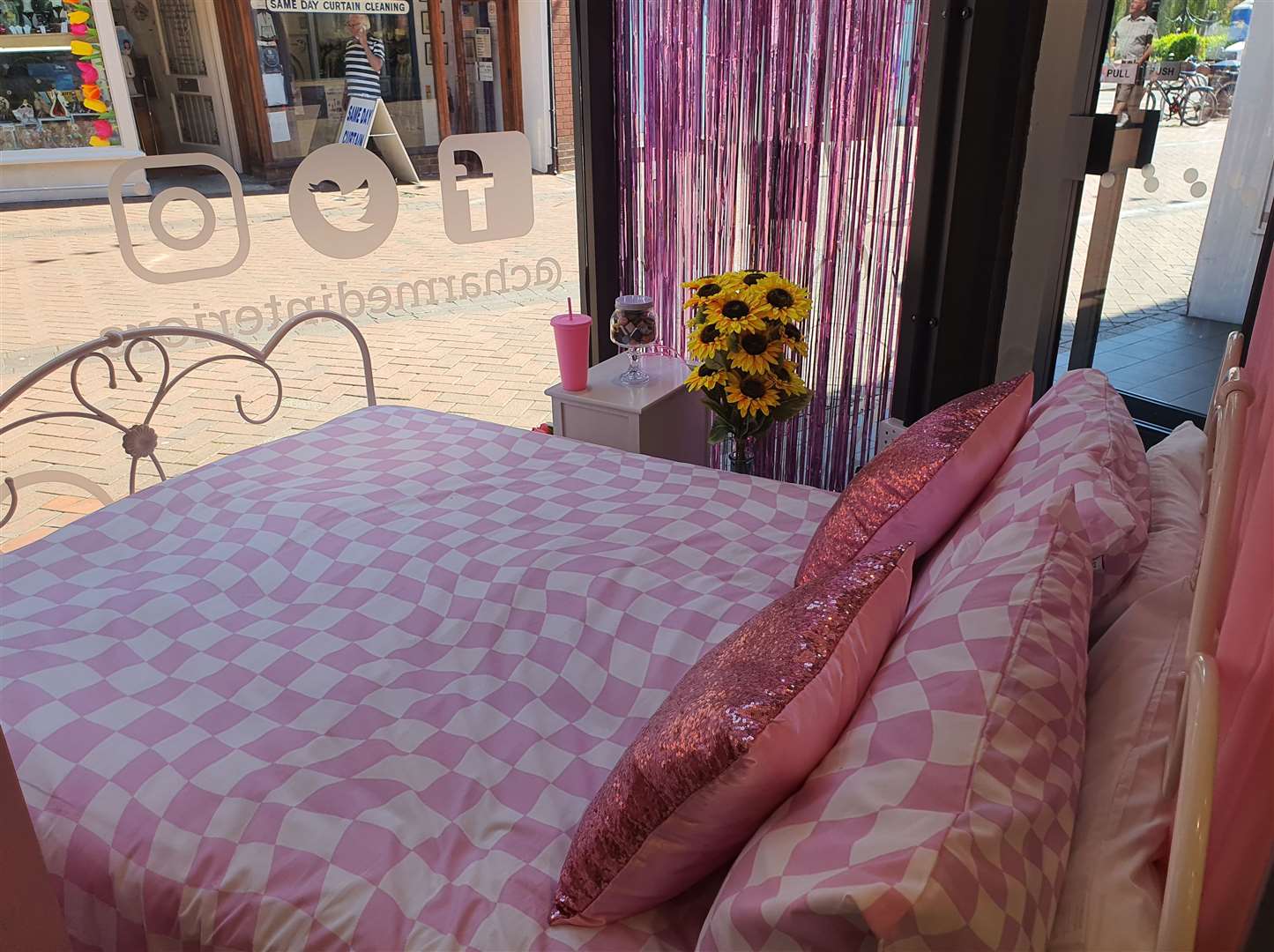 Charmed Interiors had a Barbie themed window display