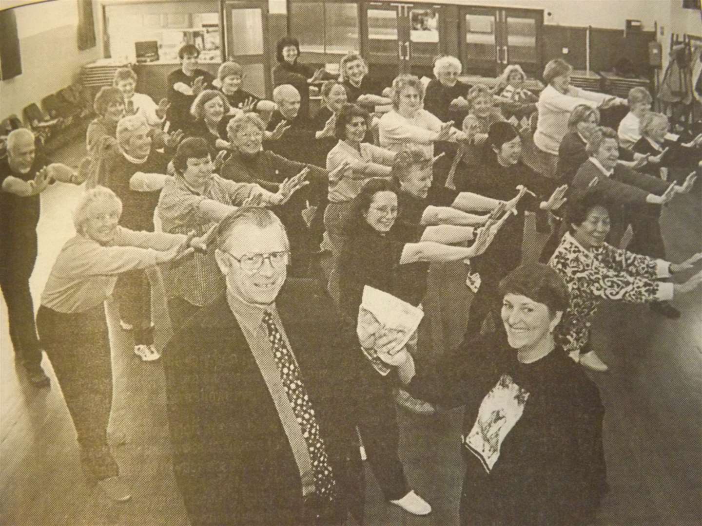 25 years ago: November 13, 1998 – Don Walker, who helped to start the Rutland Memorial Scanner Appeal with his wife Carolyn, accepts the donation from Taoist Ti Chi instructor Jean Booth.