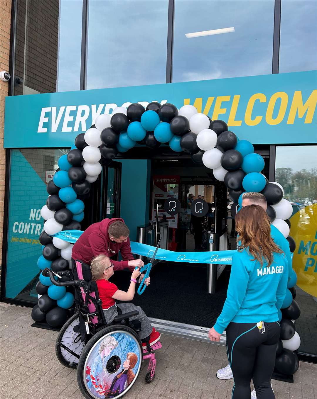 Runner Jason Wright with daughter Olivia opening PureGym in Stamford
