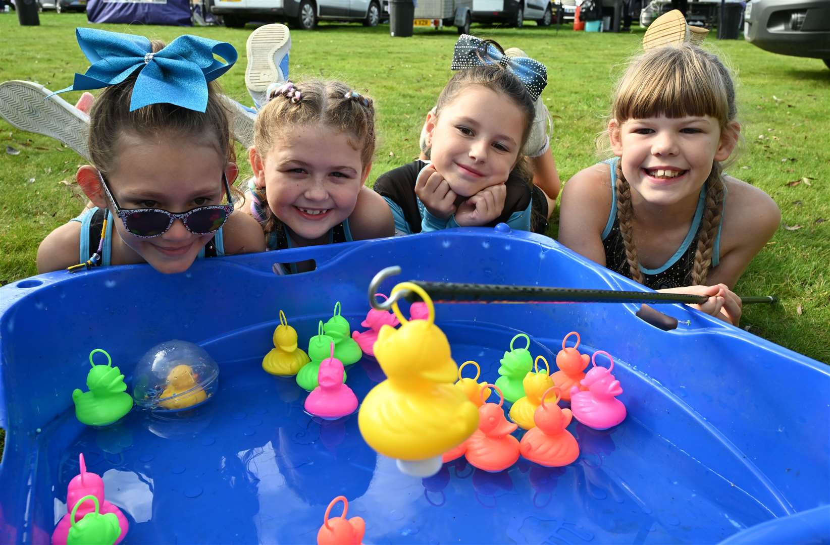 Hooking a duck are Layla, Amanda, Chloe and Amelie from the Empire Cheerleaders.