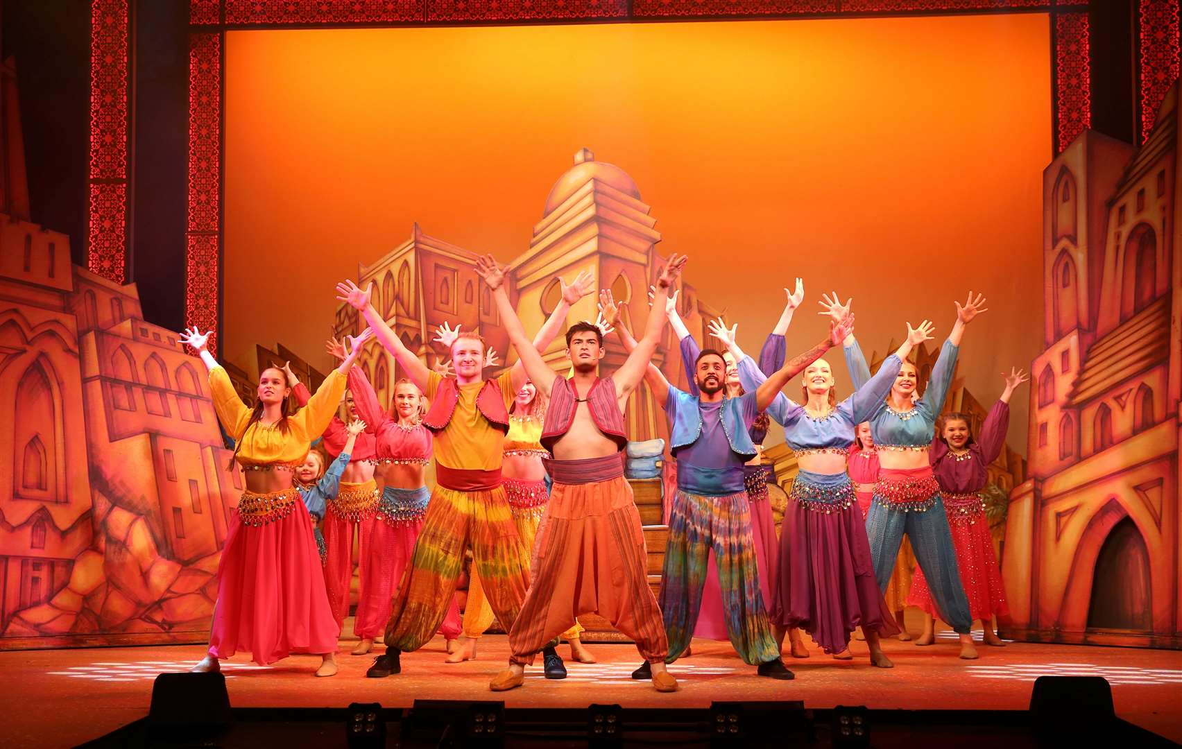 Matt Alexander-Lautman as Aladdin and Ensemble - Photo credit Caroline Keyworth
