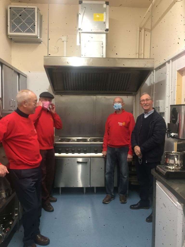 President Yim Kong (left) and members of Stamford Rotary St Martins viewing the new kitchen and ovens
