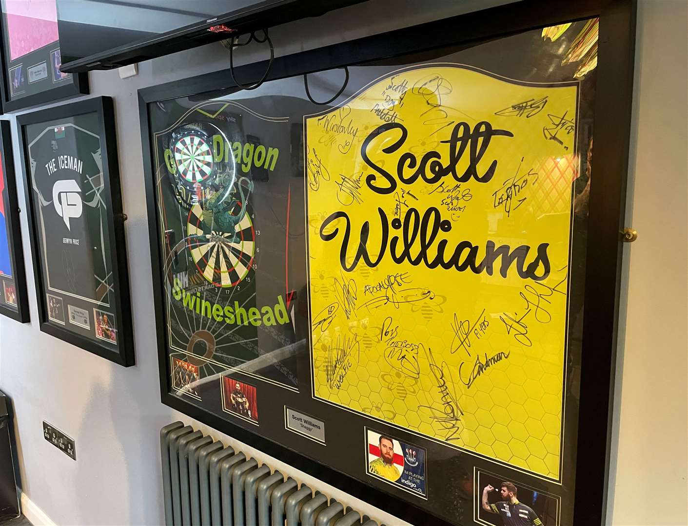 Memorabilia hangs from the walls at the Green Dragon