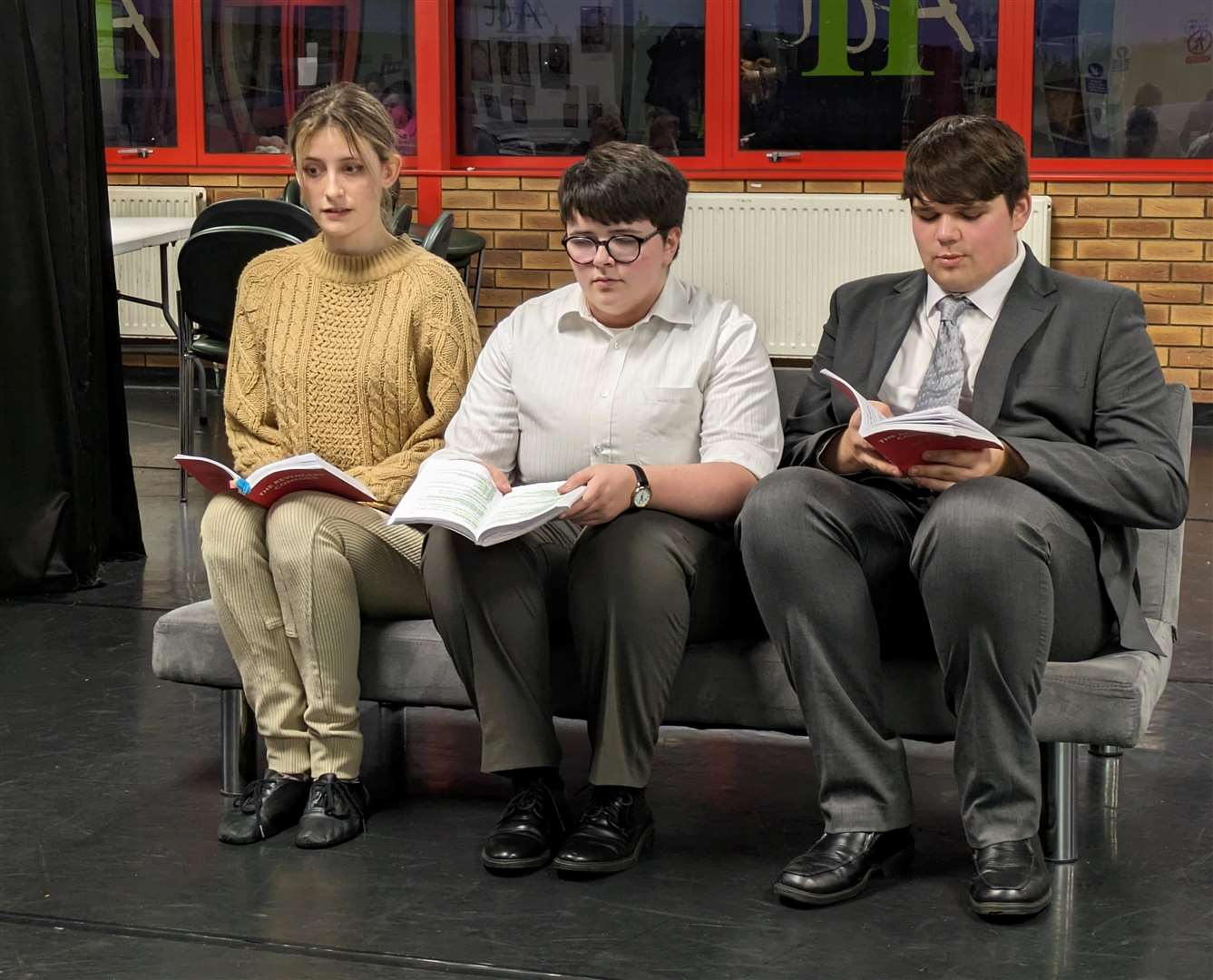 The cast in rehearsals