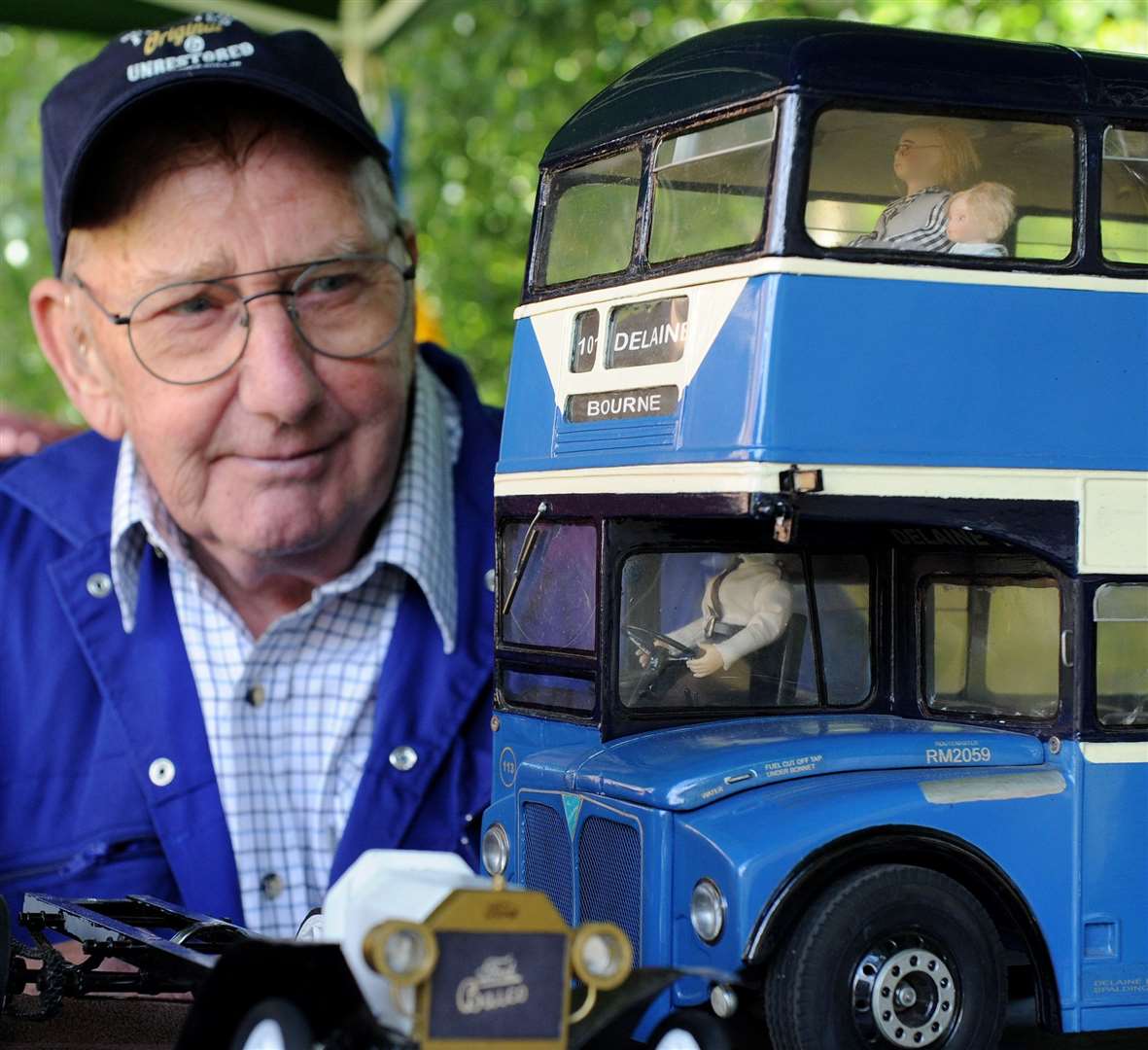 Len Cooper of Bourne with a Delaine model bus. Photo: Iliffe Media
