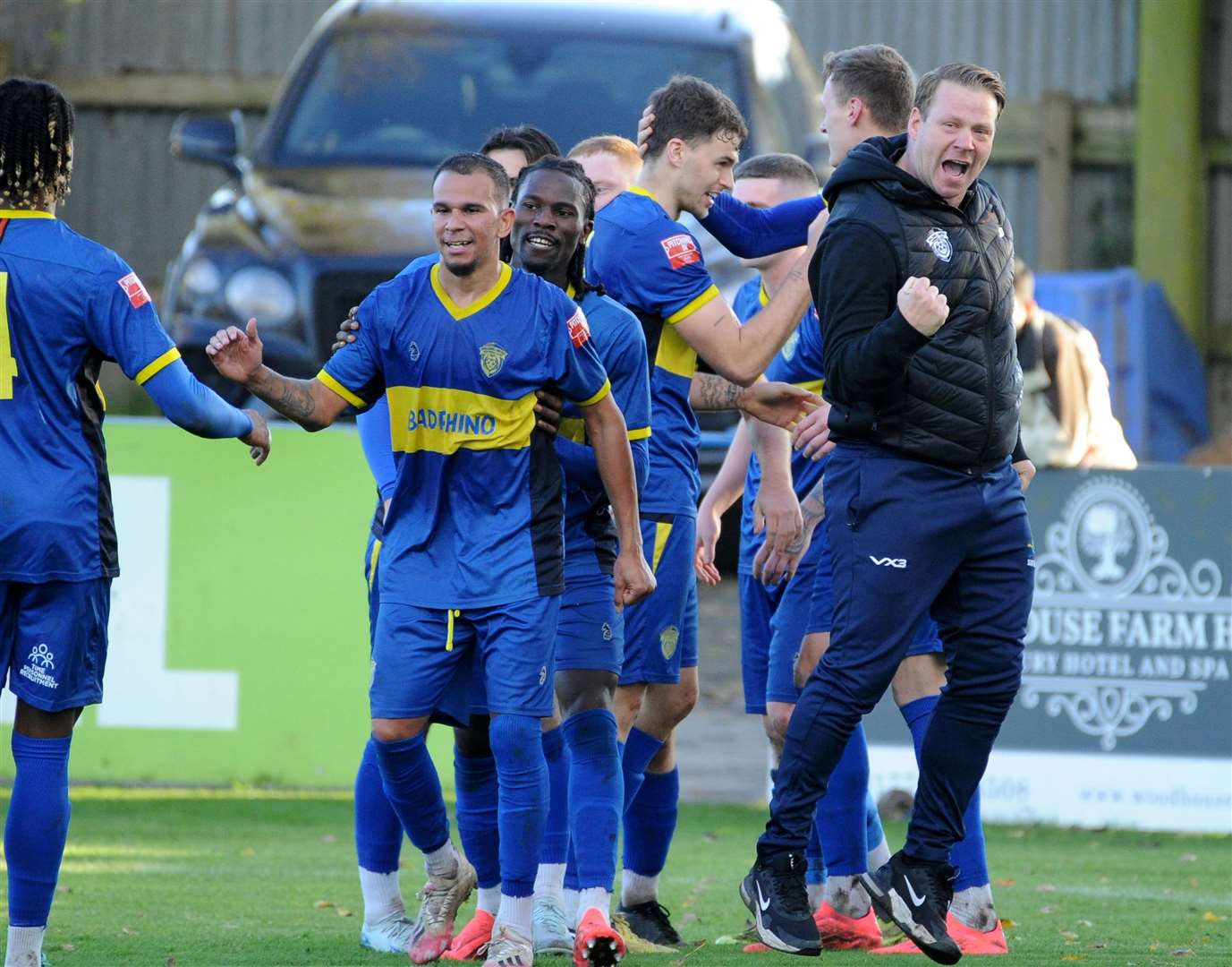 Manager Jimmy Dean celebrates his players after their second goal. Photo: Chris Lowndes