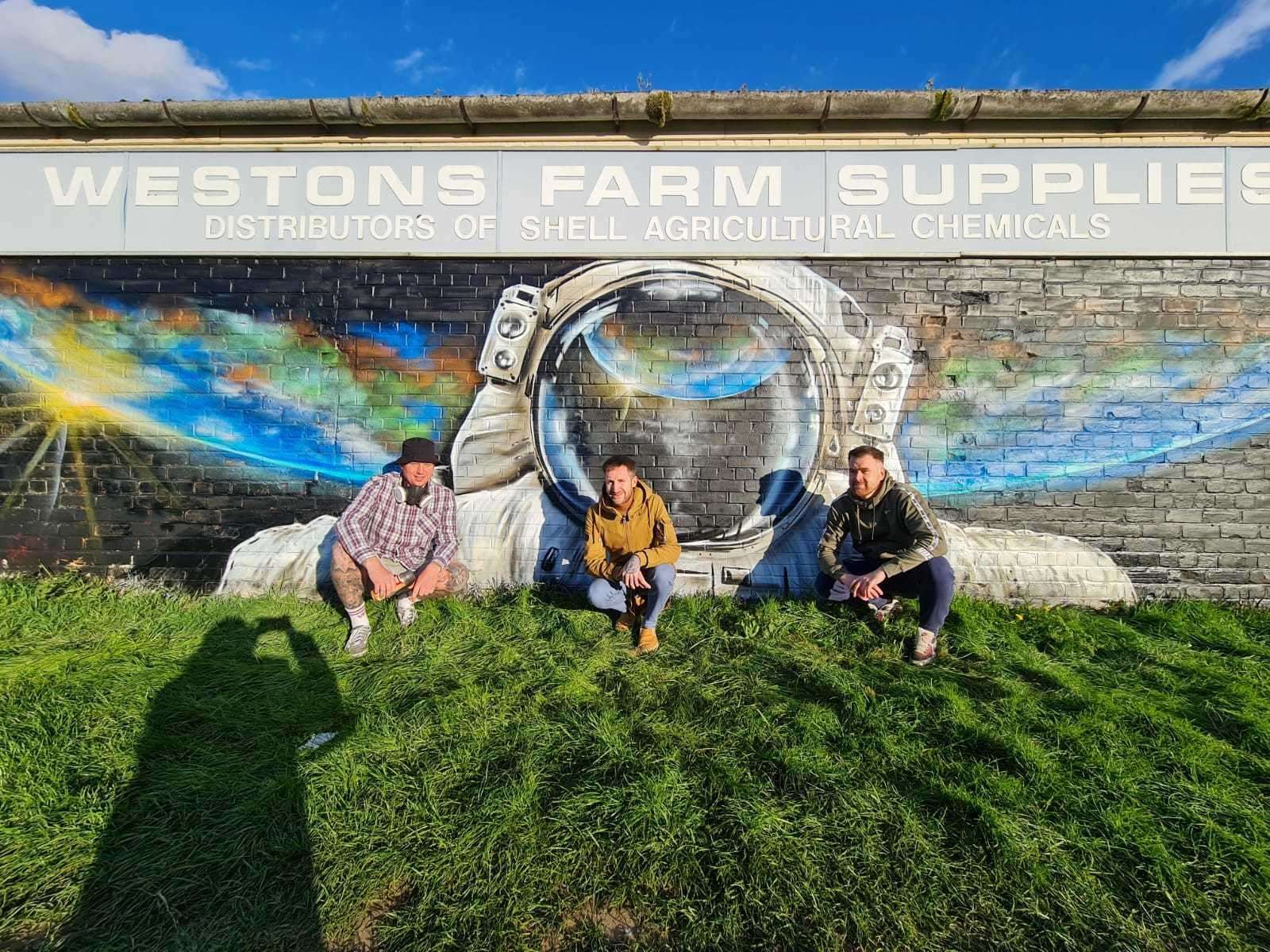 Karl Barfoot, Edgars Bokans and Adam Sadd in front of Westons Farm Supplies (45892427)
