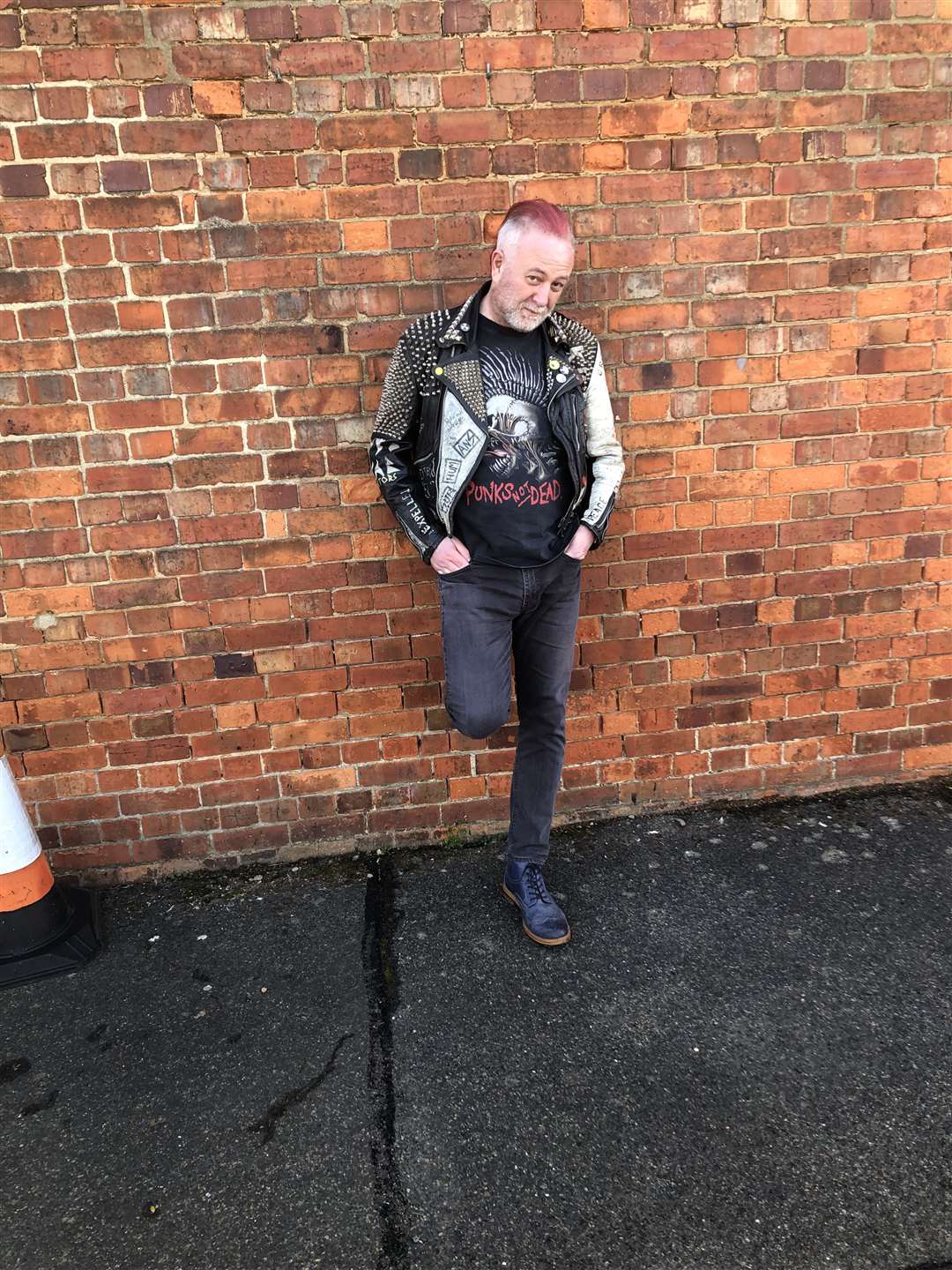 Colin Young has raised £1,400 by cutting and dying his hair
