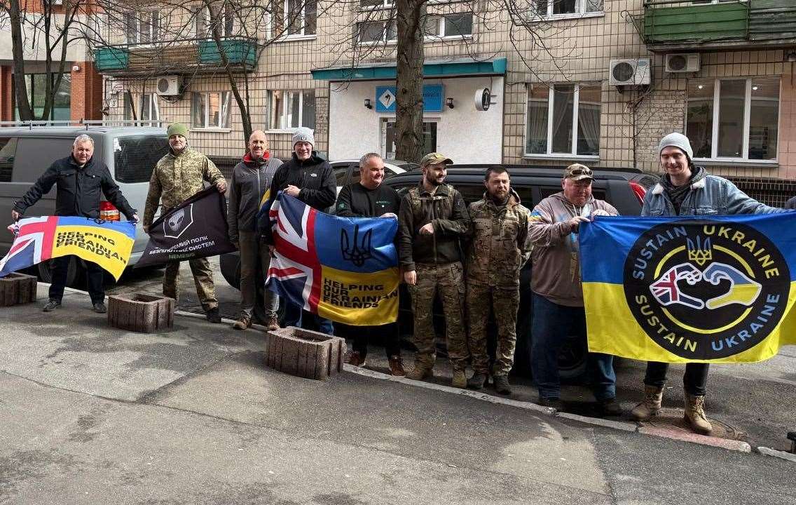 HOUF drivers Dave Ribakovs and Richard Astle and Princebuild director Mark Asplin with members of the Sustain Ukraine charity