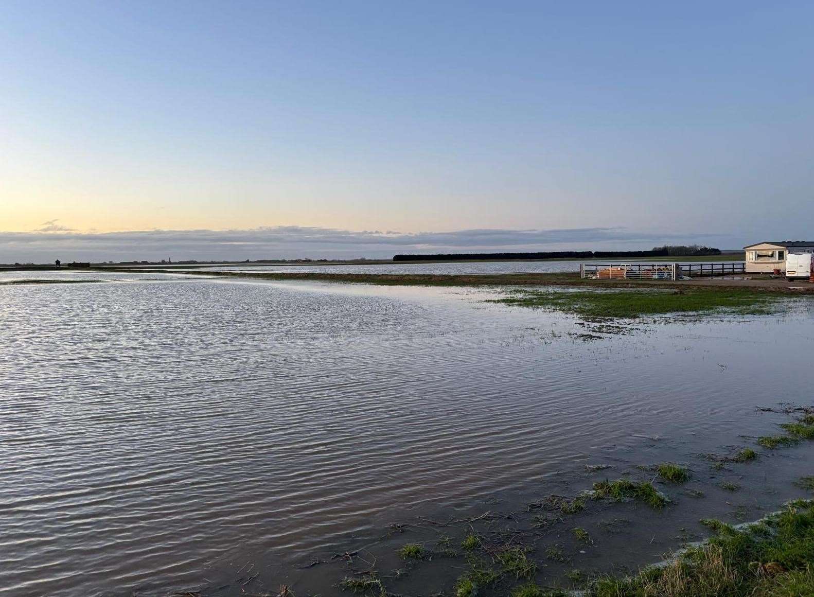 Fields are now underwater after the South Forty Foot Drain overtopped as a result of a damaged bank
