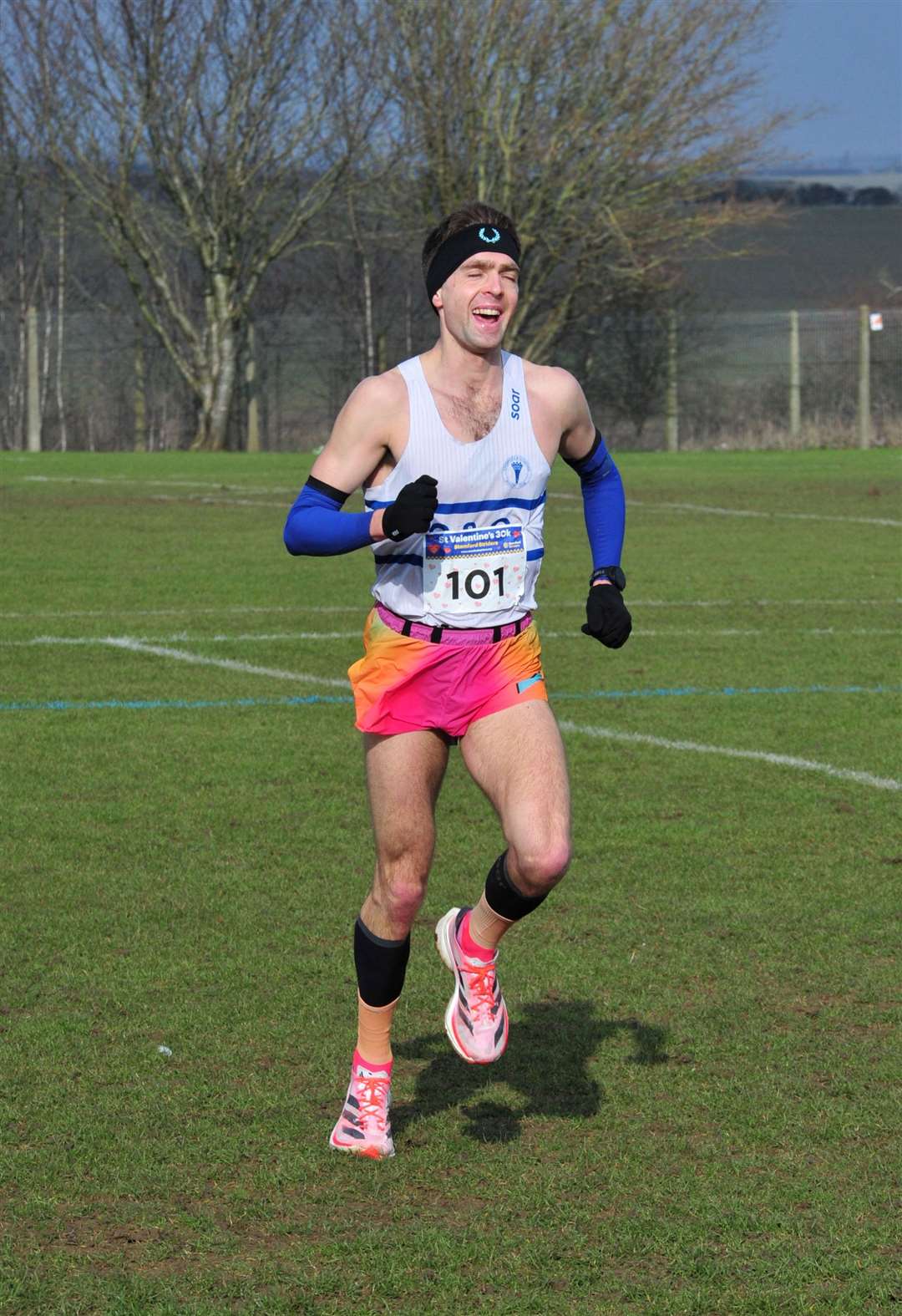 Race winner Jonathan Escalante-Phillips looks relieved as he approaches the line