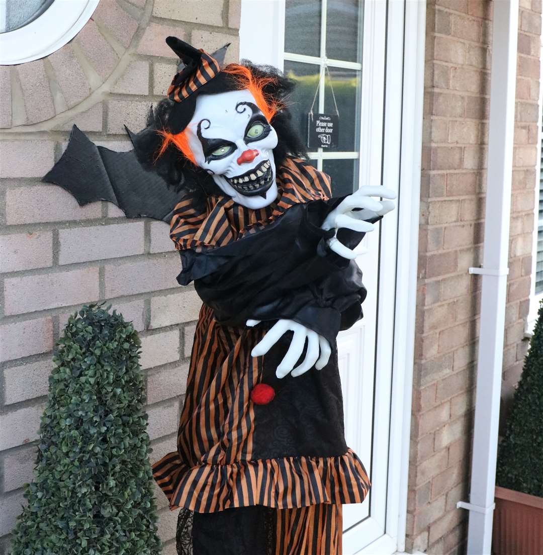 An evil clown greets you at the front door