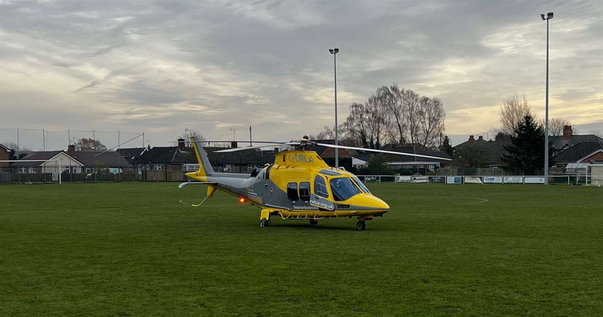 The Air Ambulance helicopter landed on the pitch in Collingham.