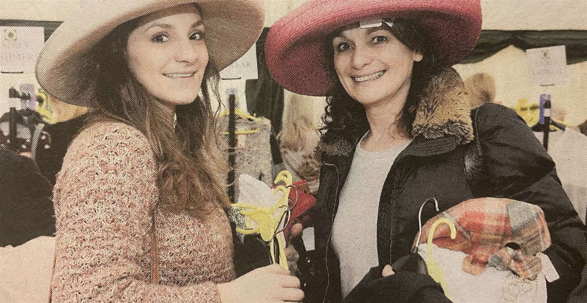 Debbie Sorter and Diana Nicols try out hats 10 years ago