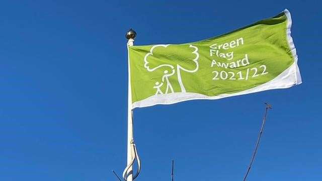 A Green Flag flies