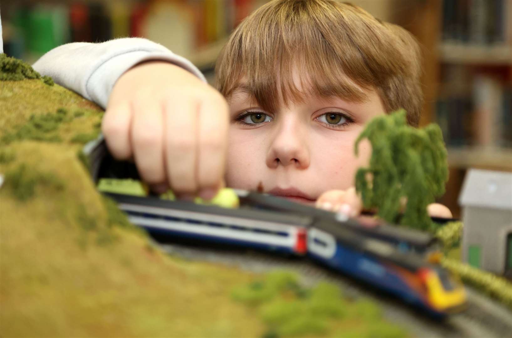 Kohle, 11, makes a small adjustment