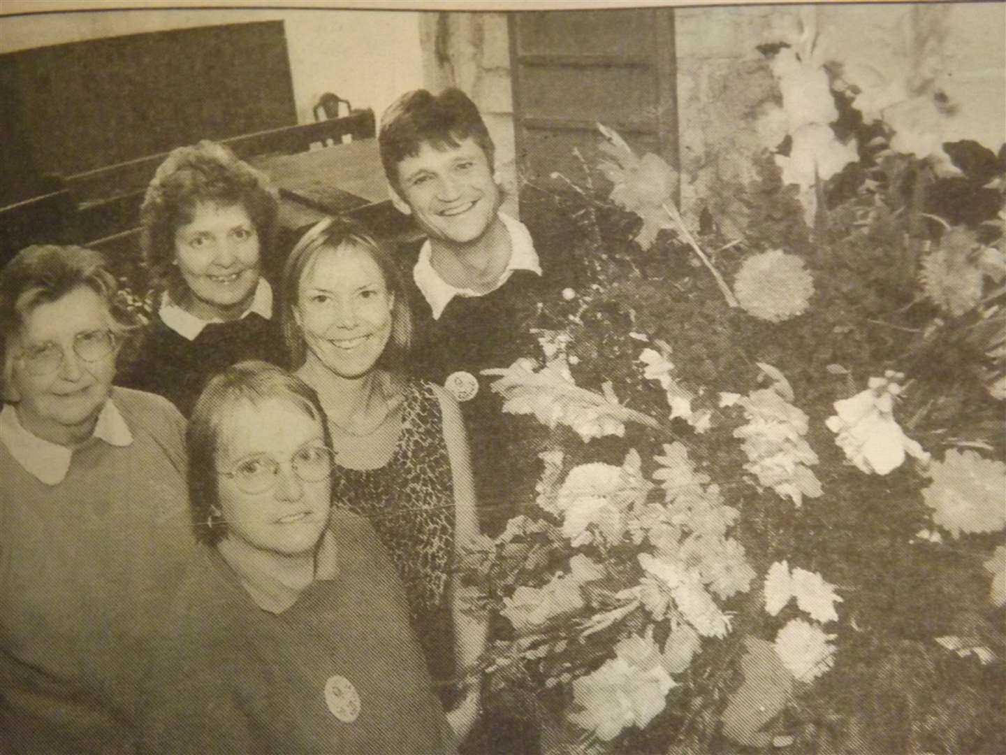 25 years ago: September 18, 1998 – A group admire one of the flower arrangements at Northborough church.