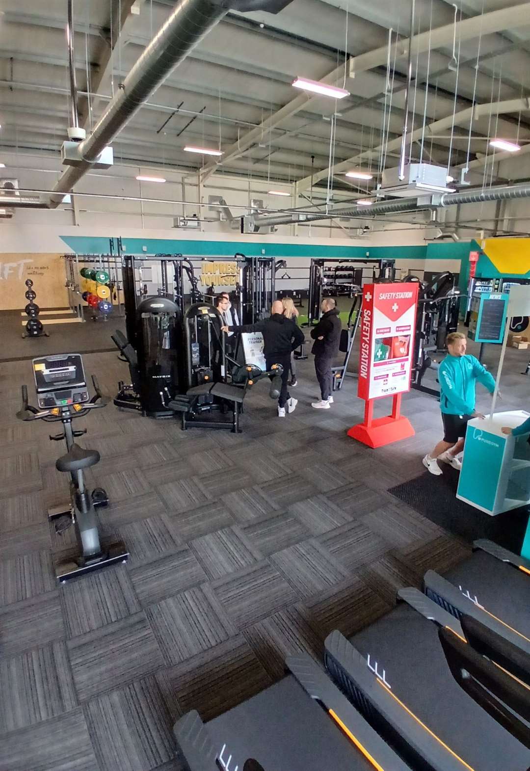 Looking across the gym floor in the former Carpetright building