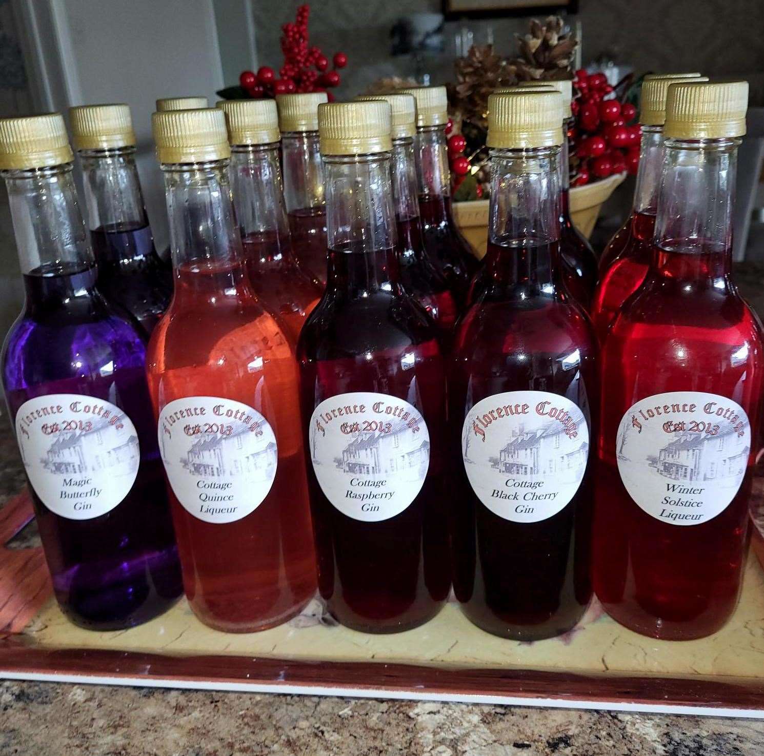 Magic butterfly gin, cottage quince liqueur, cottage raspberry gin, cottage black cherry gin and winter solstice liqueur