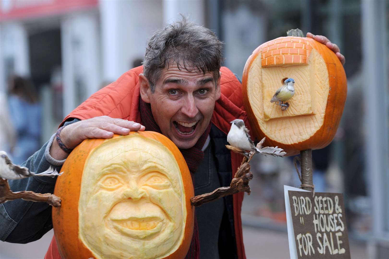 Artist Jonathan Nicholls with the sculptures in Pumpkin Street aka Spalding's Bridge Street