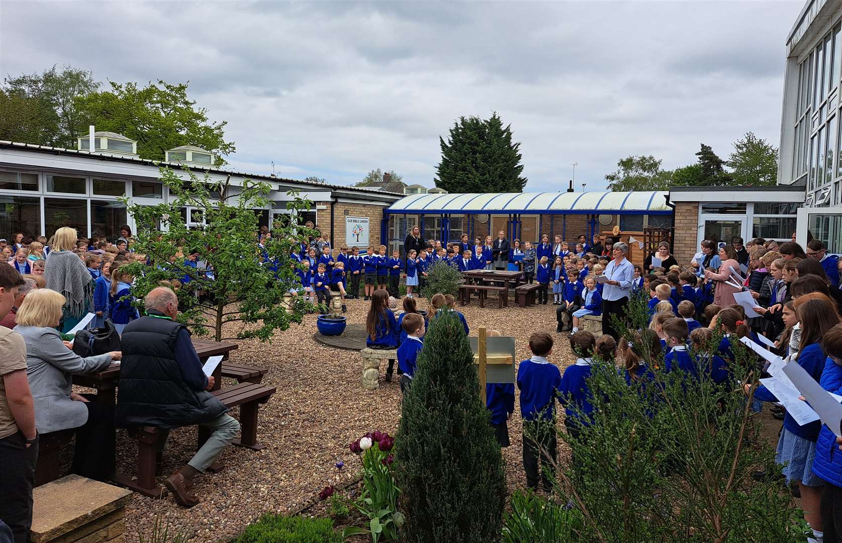 Pinchbeck East C of E Primary School singing their school hymn