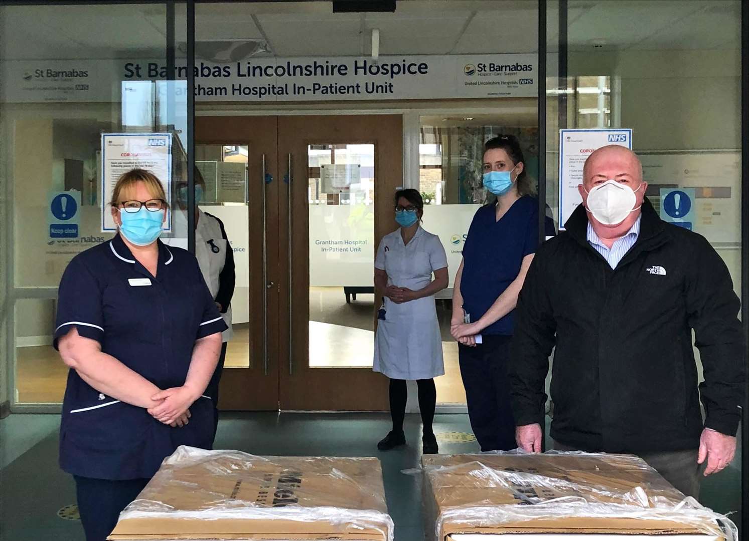 Sister Cathie Alcock and Hospice staff with Rob DIxon. (43883521)